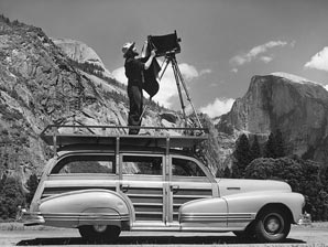 Ansel Adams and his mobile tripod. (1947)